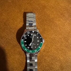 Tissot Silver and Green Seastar 1000 GMT Quartz